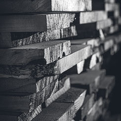 Stacks of raw wood at Omega's Rough Mill