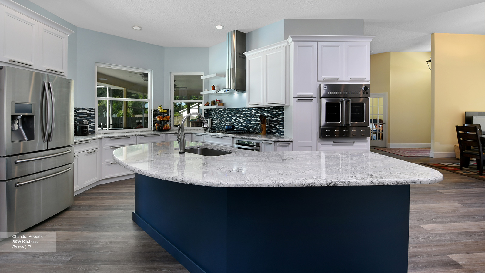 Off White Kitchen with Blue Island Cabinets - Omega