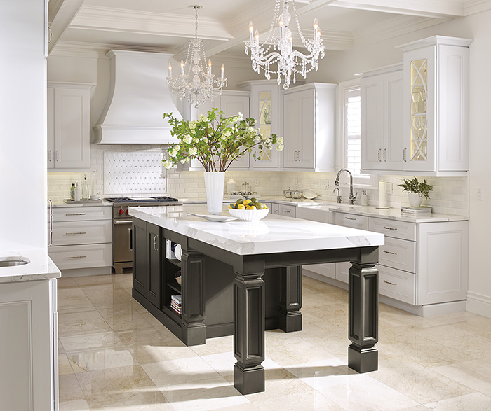 White Kitchen Cabinets with a Dark Grey Island