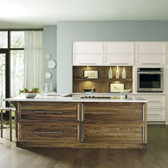 Wood kitchen cabinets in Natural Walnut and painted Maple