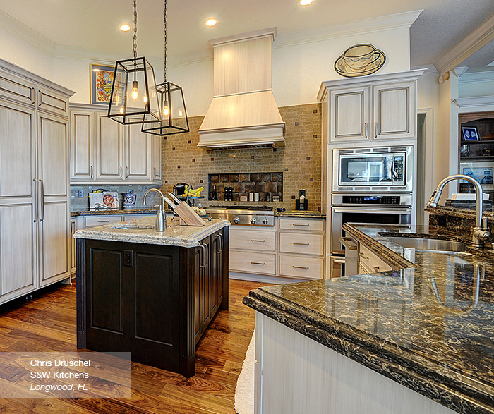 Off White Cabinets with a Dark Wood Kitchen Island