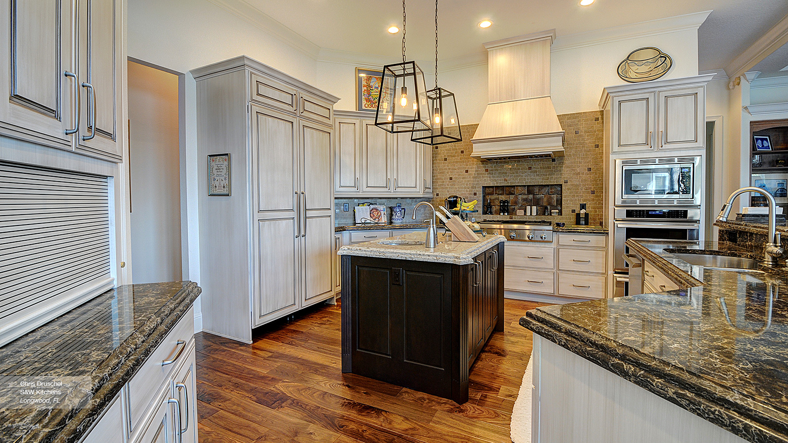 Off White Cabinets With A Dark Wood Kitchen Island Omega