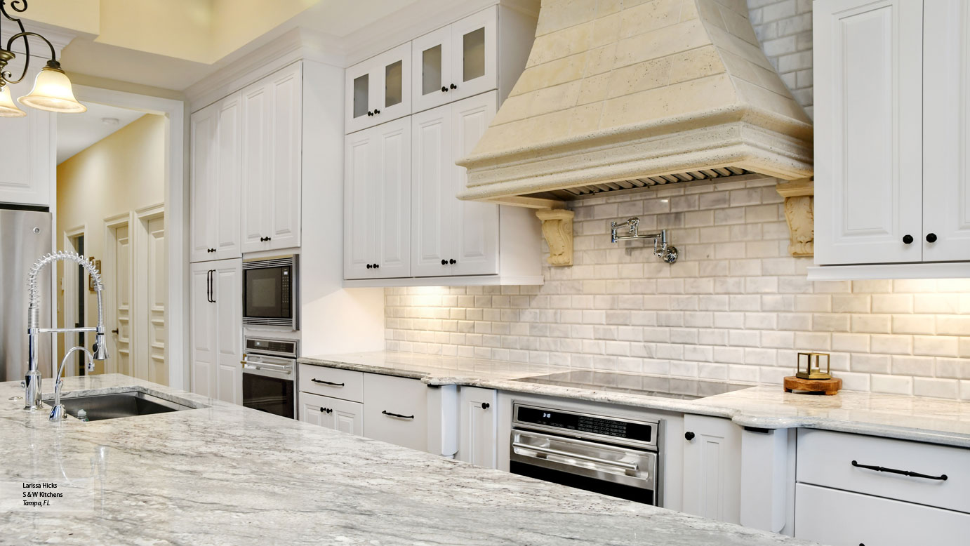 Kitchen with White and a Gray Island Omega