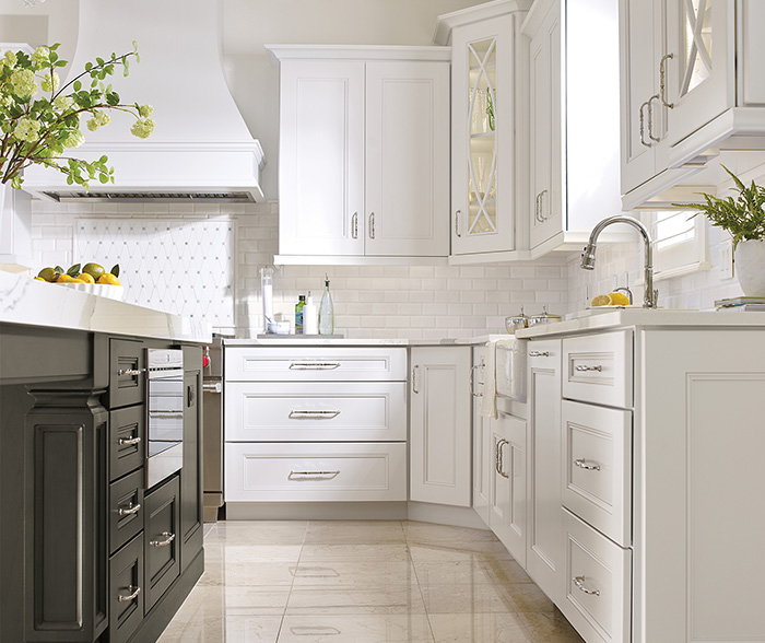 White Kitchen Cabinets with a Dark Grey Island