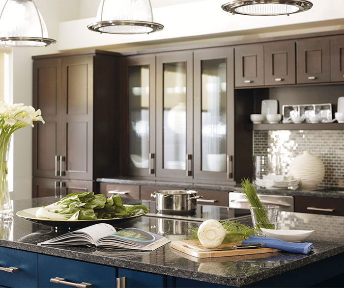 Dark Wood Cabinets With A Blue Kitchen Island Omega