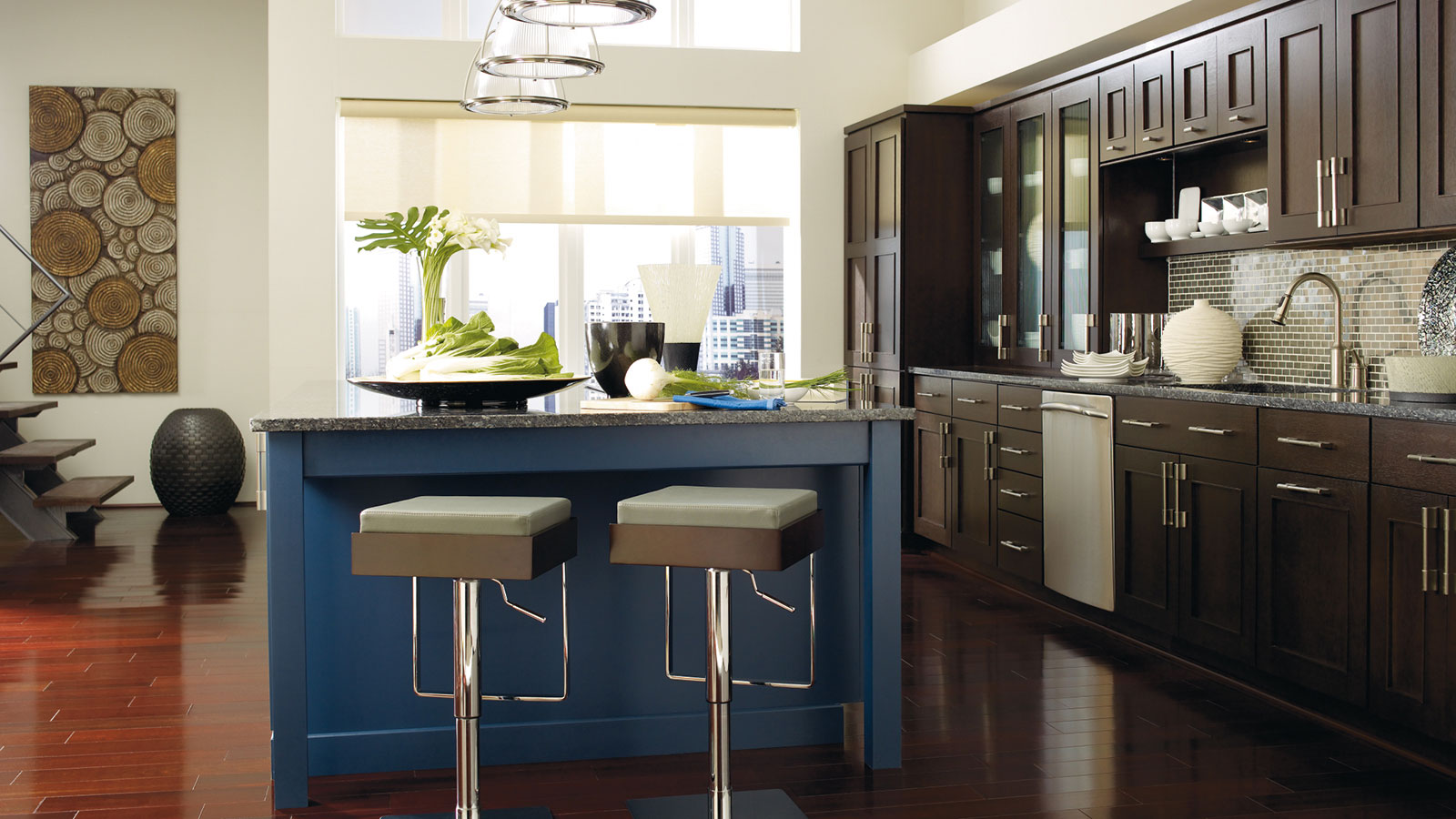 Dark Wood Cabinets With A Blue Kitchen Island - Omega