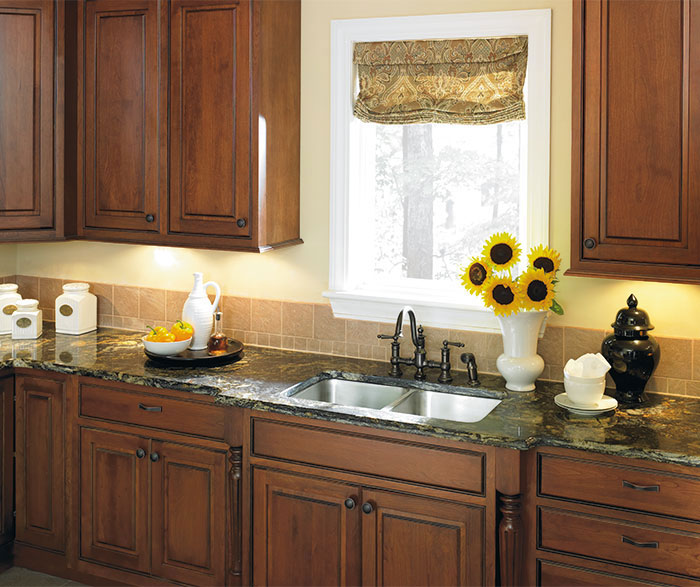 Close up of Portage inset kitchen cabinets in Cherry Nutmeg Onyx finish