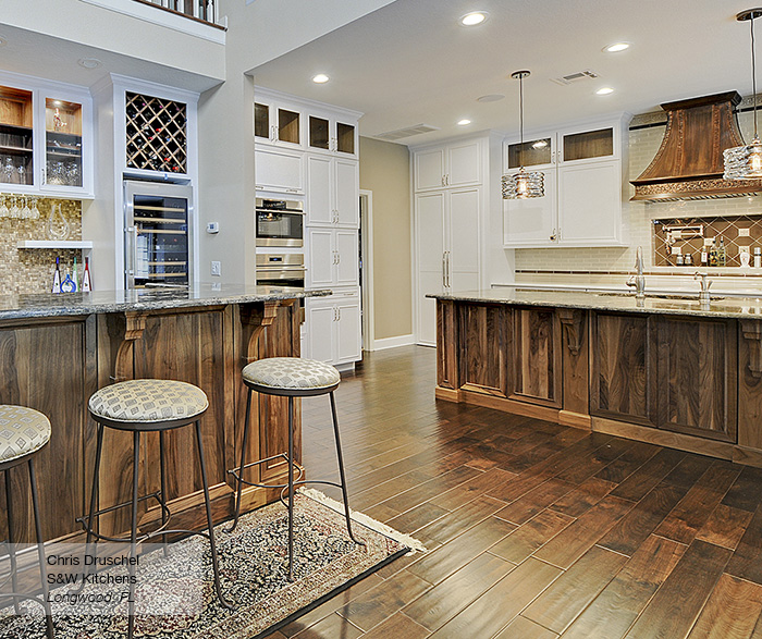 White Cabinets with a Walnut Kitchen Island