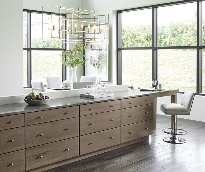 Contemporary kitchen with Cayhill Walnut cabinets in Pumice