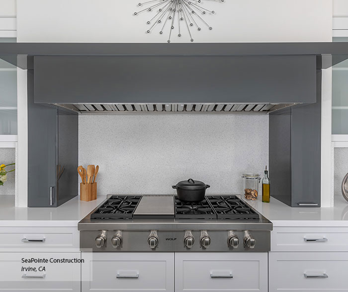 White Cabinets and Stylish Wood Hood in Dark Grey