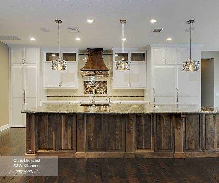 Riff kitchen cabinets in maple pure white with a walnut island in walnut natural