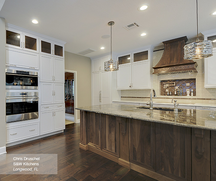 White Cabinets with a Walnut Kitchen Island