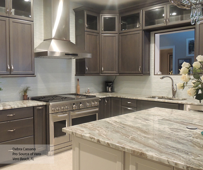 Ultima gray cabinets with an off white kitchen island